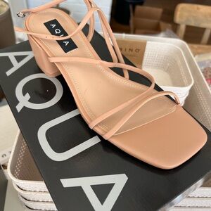 Aqua tan strappy sandals. Block heel. 1 1/2 inch high heel approx.